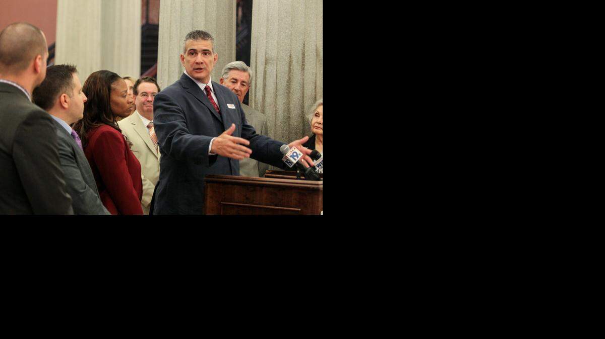 
USC men's basketball Coach Frank Martin helped the American Cancer Society Cancer network kick off the Kick Cancer during Suits & Sneakers event. As a way or raising awareness to cancer, many legislators wore sneakers to session.
