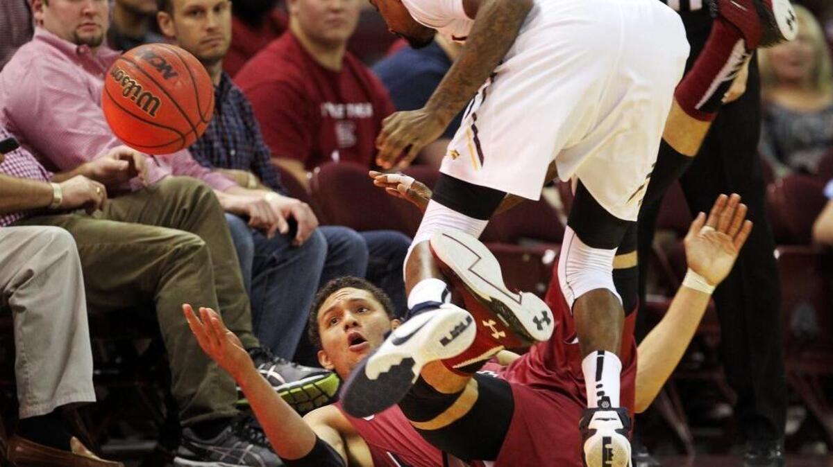 South Carolina's Michael Carrera dives for a loose ball as the Gamecocks take on Drexel at the Colonial Life Arena.