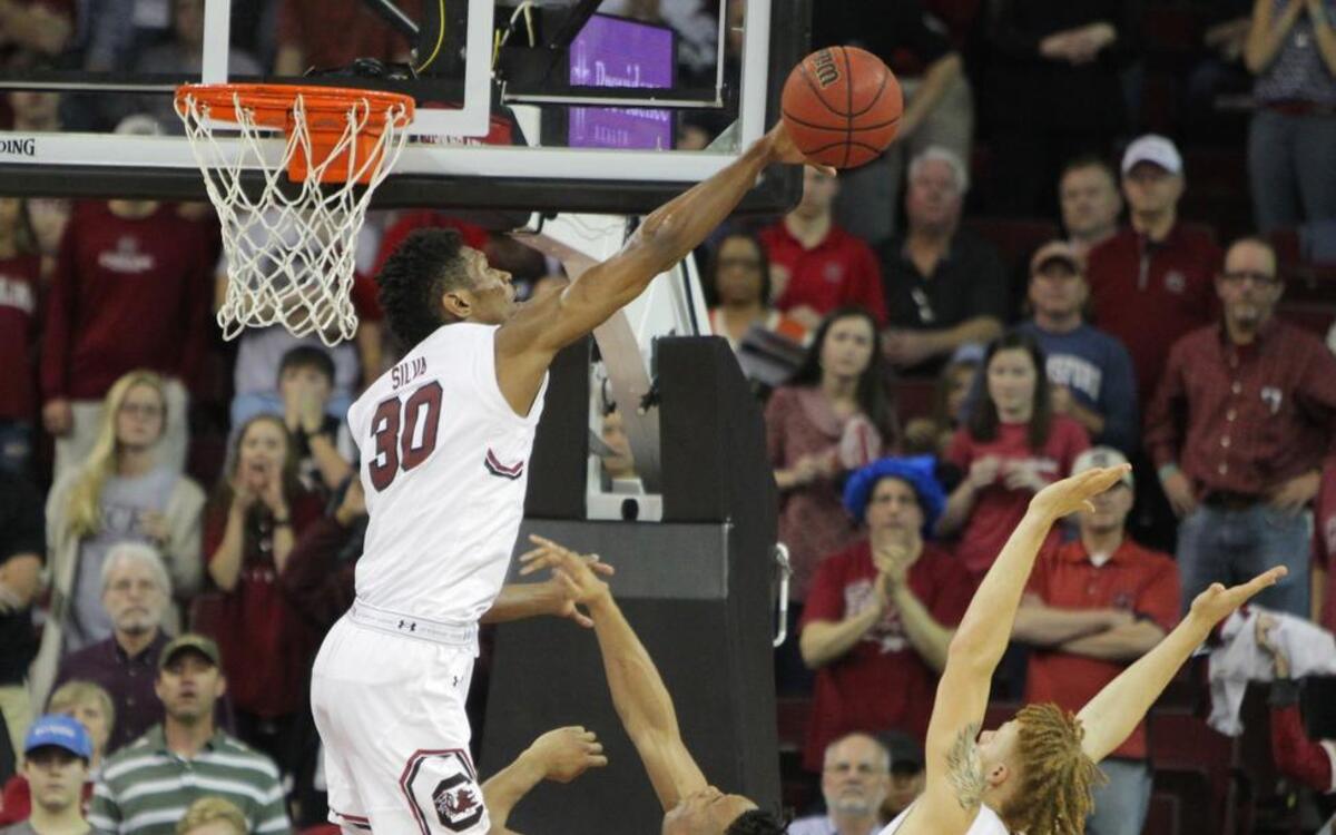 South Carolina Gamecocks forward Chris Silva (30) blocks a shot by Alabama Crimson Tide guard Dazon Ingram (12)