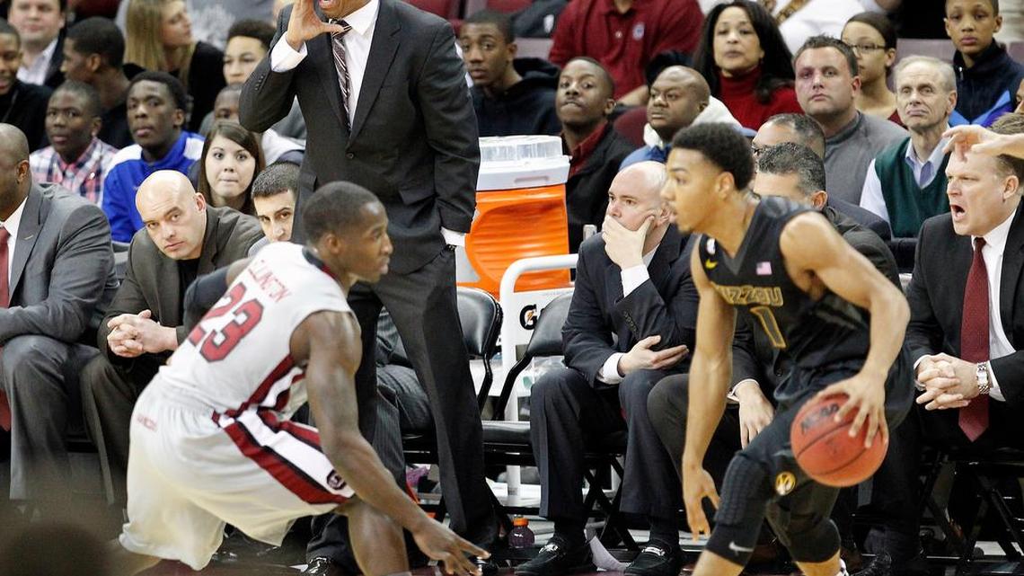 Former University of South Carolina assistant coach Lamont Evans shouts to players as they take on Missouri in a game in 2013.