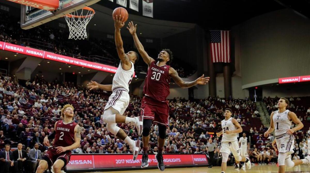 Texas A&M Aggies guard T.J. Sparks (2) goes up for a shot against South Carolina Gamecocks forward Chris Silva (30) at Reed Arena.