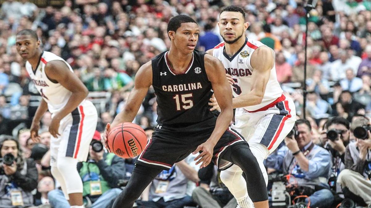 PJ Dozier looks to pass in the Final Four.