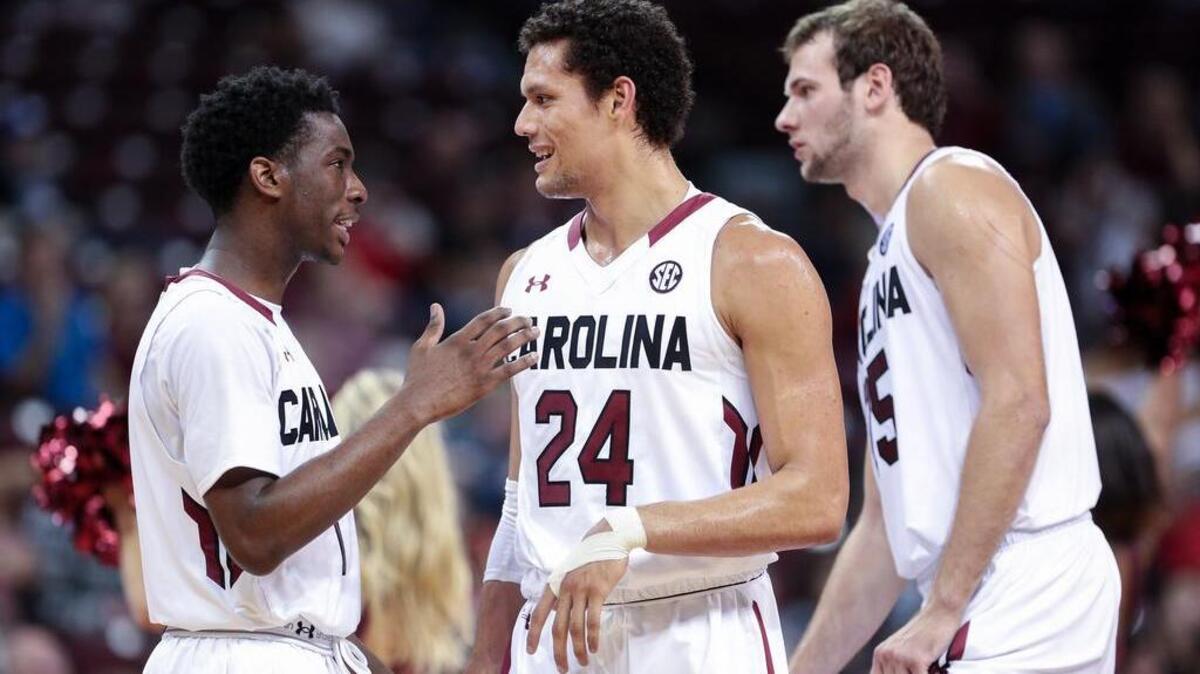 South Carolina’s Marcus Stroman (1) Michael Carrera (24) and Mindaugas Kacinas.