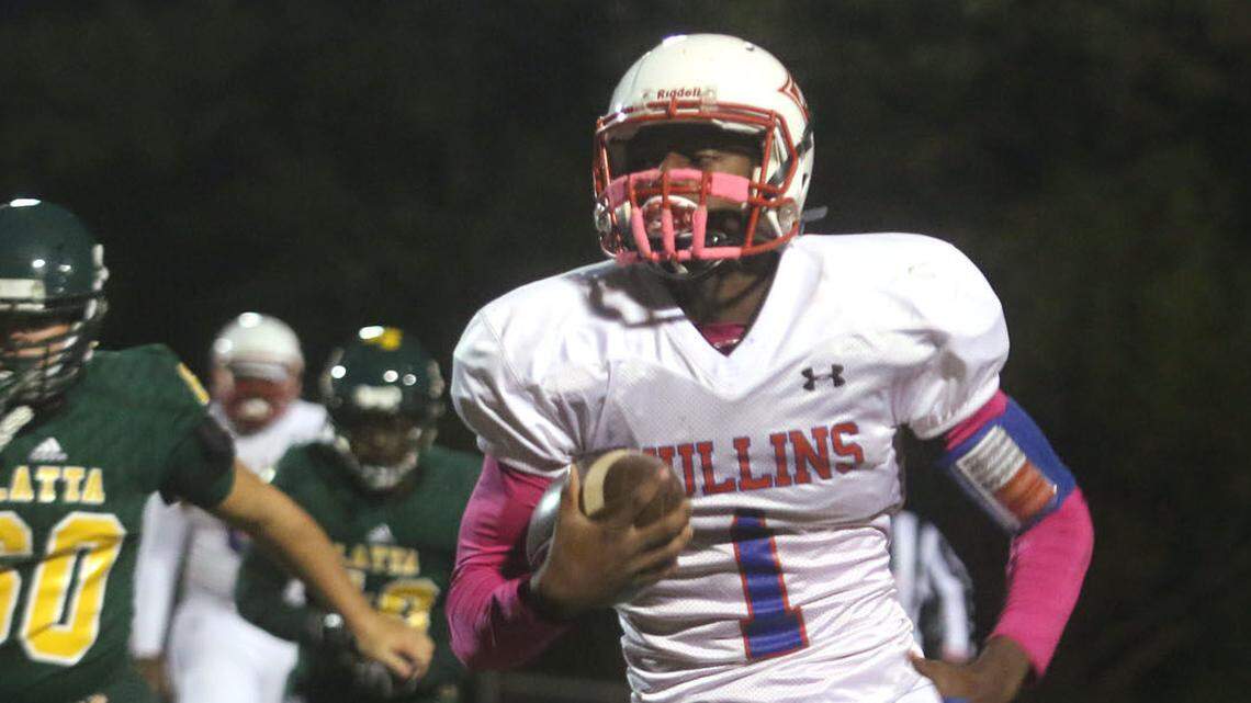 Mullins’ Xavier Legette runs during a game against Latta High School.