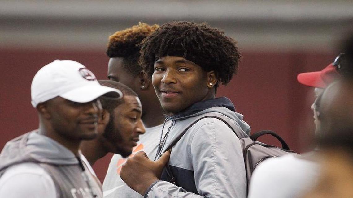 Kingsley Enagbare, center, took part in Will Muschamp's football camp last week.
