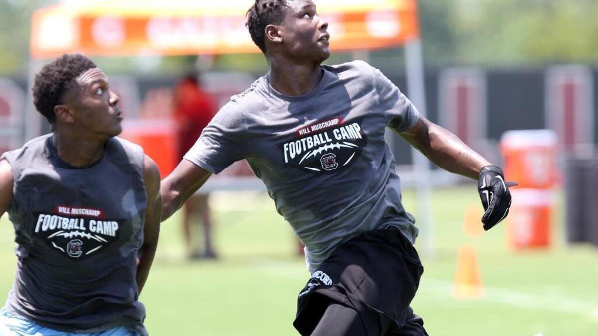 Defensive back Hamsah Nasirildeen, right, of Concord, NC, also camped at South Carolina earlier this summer.