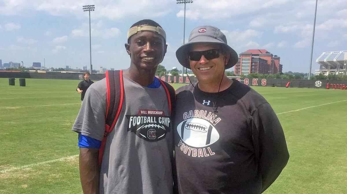 Darius Rush with USC assistant Lance Thompson at a South Carolina camp last summer.
