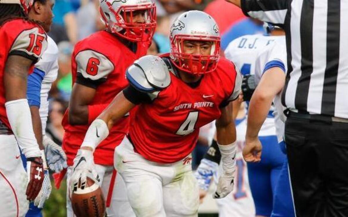 South Pointe’s Nick McCloud (4) makes an interception in the end zone of this season’s state championship game.