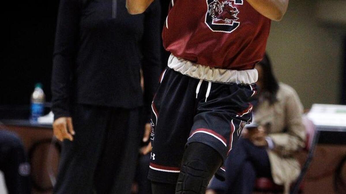 Under the watchful eye of coach dawn Staley, left, South Carolina’s Tiffany Mitchell practices.