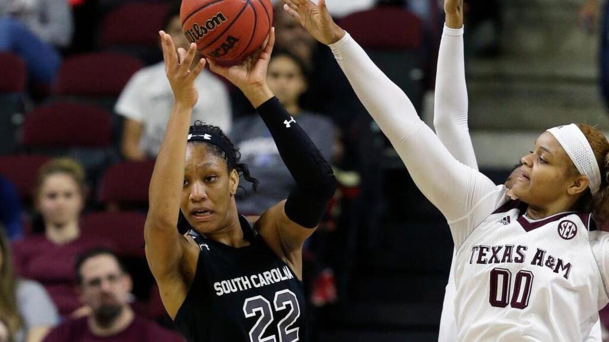South Carolina's A'ja Wilson grabs a rebound from Texas A&M's Khaalia Hillsman (00) during their game Sunday in College Station, Texas.