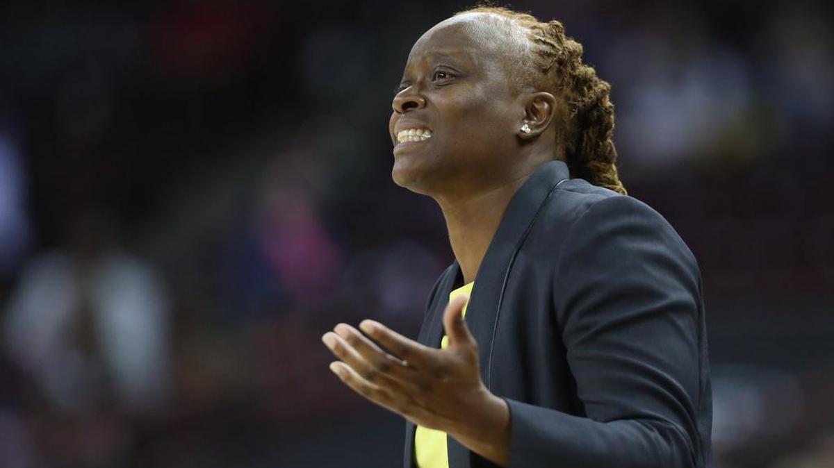 Cocker College head coach and former Gamecock Shannon Johnson cheers on her team during the first half of action against the Gamecocks in the Colonial Life Arena.