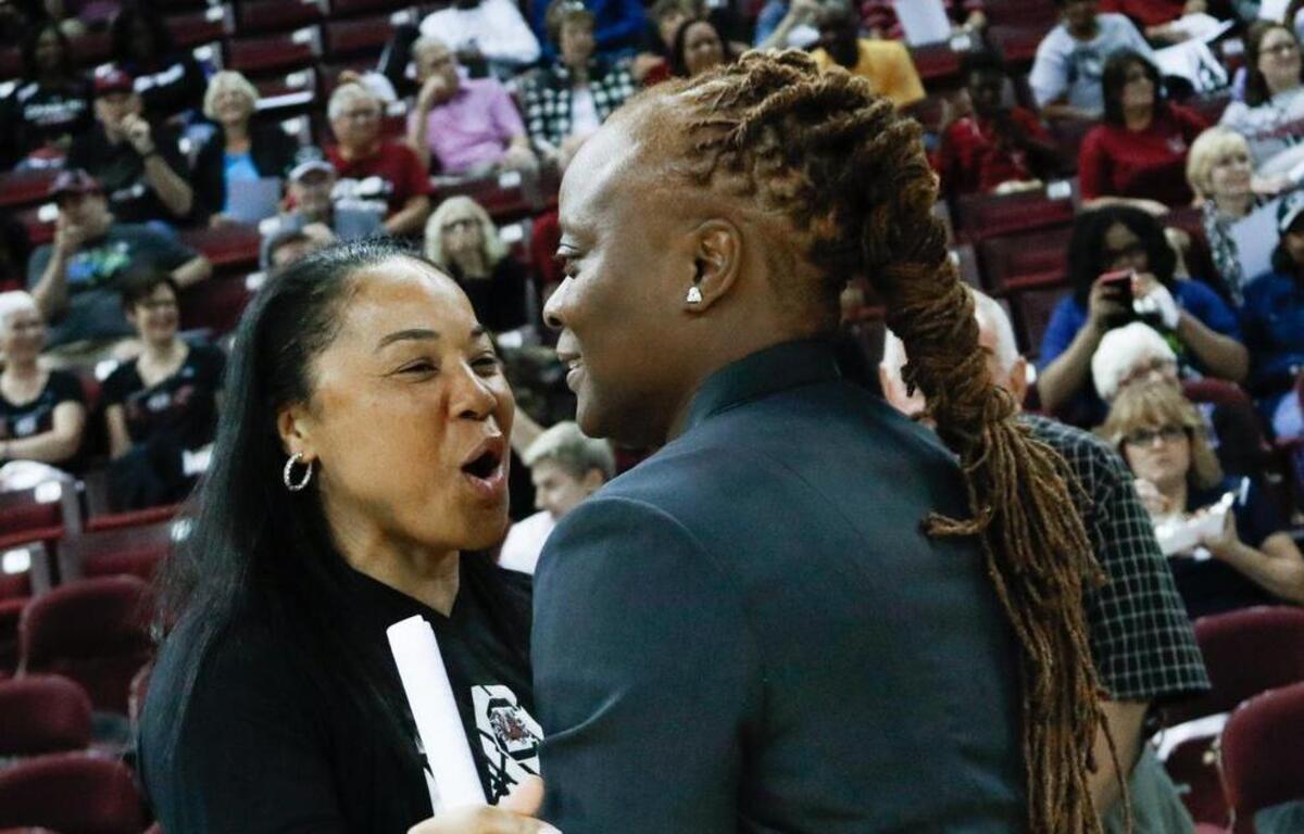 USC head coach Dawn Staley greets former Gamecock Shannon Johnson (then coach at Coker) before an 2017 exhibition game in the Colonial Life Arena.