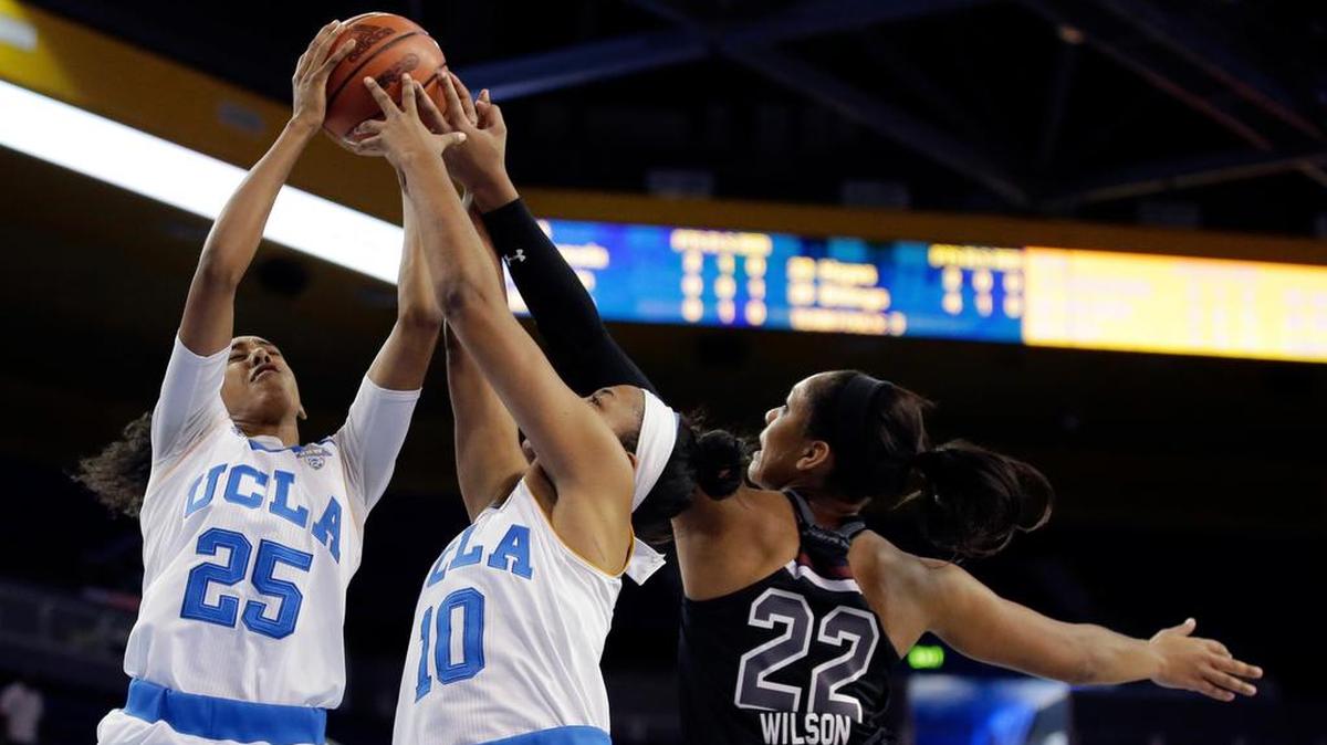 South Carolina forward A'ja Wilson, right, battles UCLA forwards Monique Billings, left, and Kacy Swain for a rebound. Wilson got to fulfill dreams in Los Angeles, meeting Clippers star Blake Griffin and dining with Candace Parker.