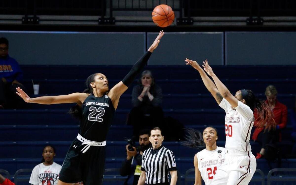 Mississippi guard Madinah Muhammad (20) attempts a shot over the defense of South Carolina forward A'ja Wilson (22) during their game Thursday night in Oxford, Miss.