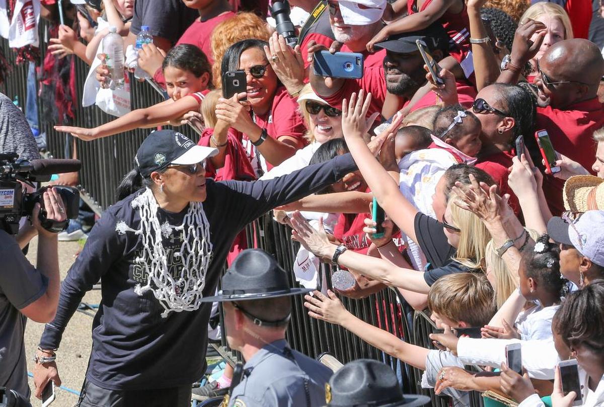 Coach Dawn Staley greets fans during a celebration and parade in downtown Columbia in honor of the National Champion University of South Carolina women’s basketball team in April.