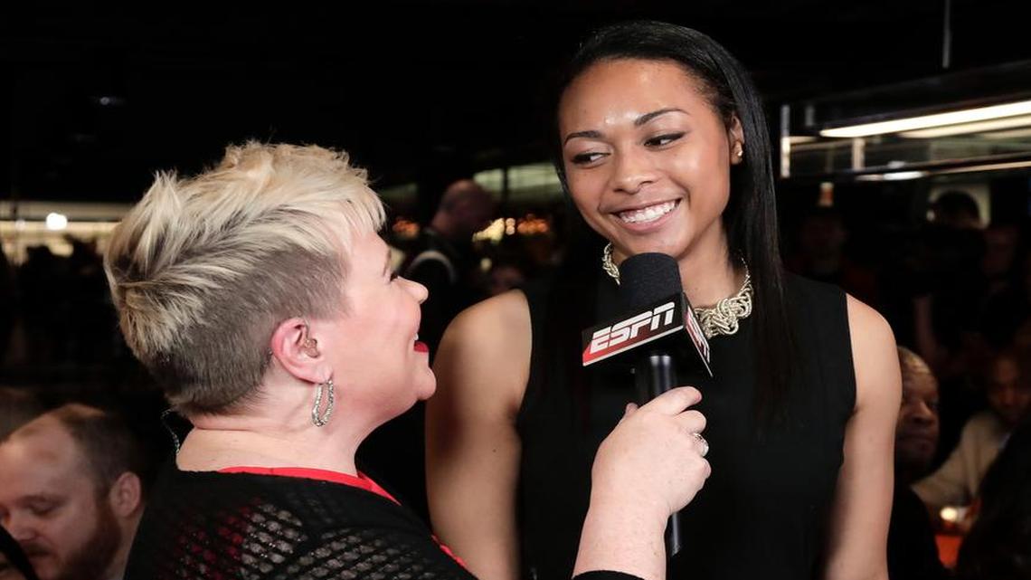 South Carolina’s Allisha Gray, right, answers questions during an interview after being selected as the No. 4 pick in the WNBA basketball draft by the Dallas Wings on Thursday in New York.