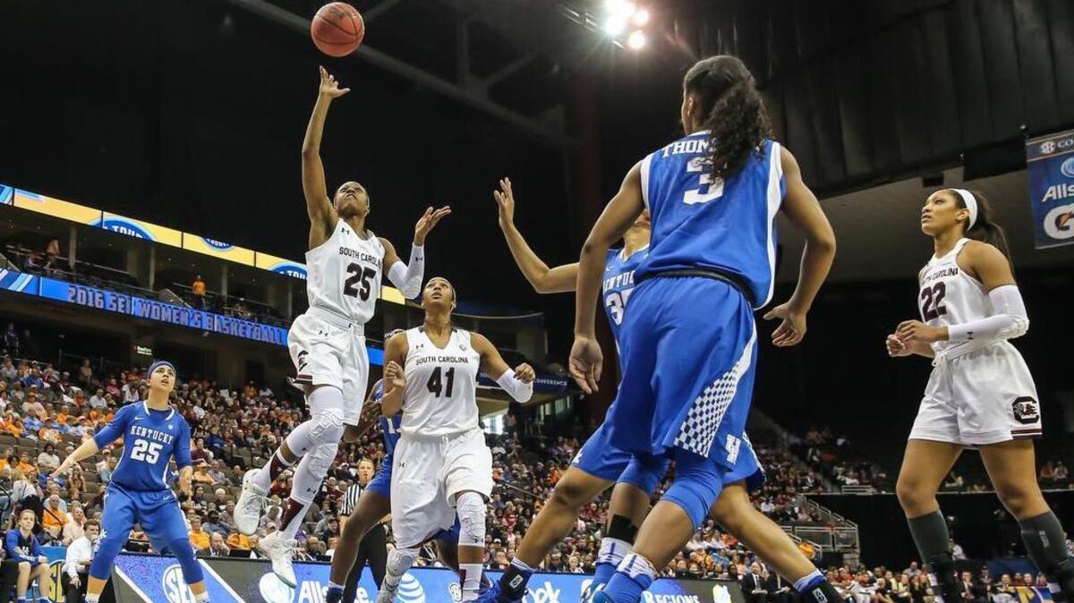 South Carolina guard Tiffany Mitchell (25) shoots the ball in front of teammate center Alaina Coates (41) against Kentucky during an NCAA college basketball game in the Southeastern Conference women's tournament semifinal in Jacksonville, Fla., Saturday, March 5, 2016.