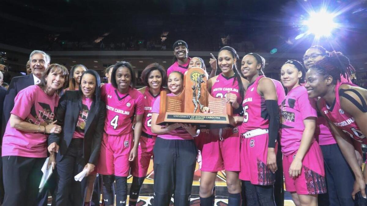 The USC Gamecocks show off their third straight SEC championship trophy.