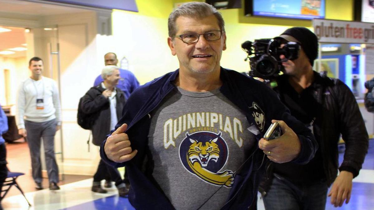 UConn coach Geno Auriemma displays a Quinnipiac University T-shirt before his team's Sweet 16 NCAA women's college basketball practice in Bridgeport, Ct., Friday, March 24, 2017.