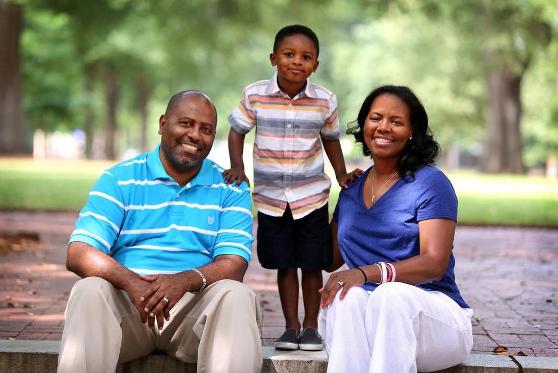 “Little Thomas” Penson stands with dad Thomas and mom Nikki McCray-Penson.