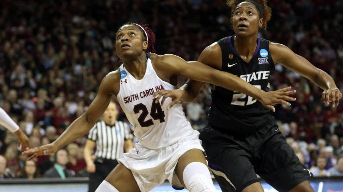 Sarah Imovbioh boxes out Kansas State’s Breanna Lewis in the second round of the NCAA tournament.
