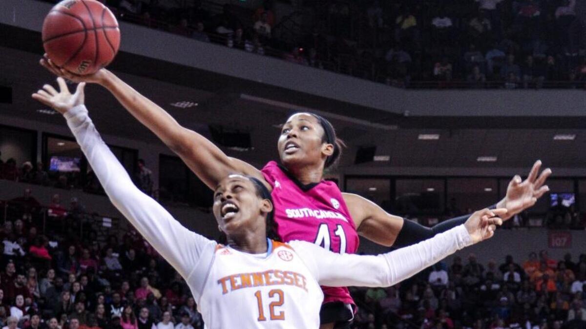 South Carolina center Alaina Coates (41) snags a rebound from Tennessee forward Bashaara Graves (12)