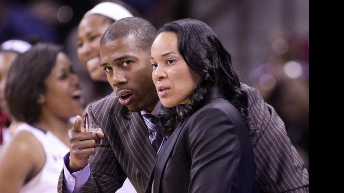 
USC coach Dawn Staley and Darius Taylor confer during the NCAA Division1 regional at Colonial Life Arena March 22, 2015.
