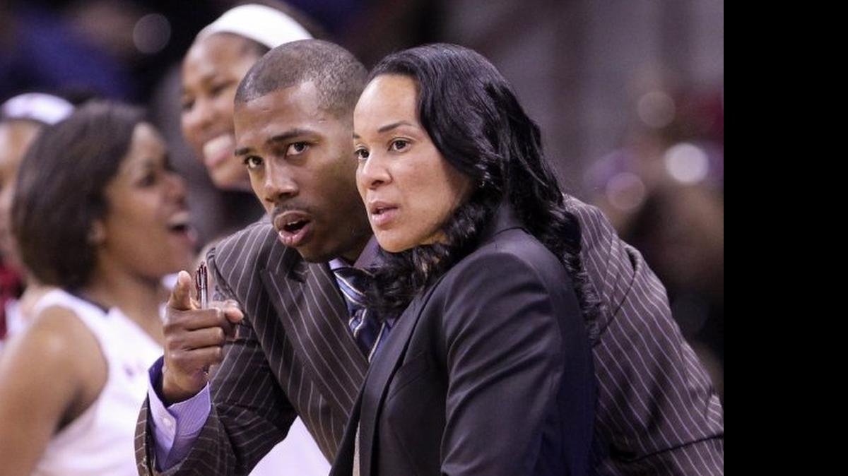 
USC coach Dawn Staley and Darius Taylor confer during the NCAA Division1 regional at Colonial Life Arena March 22, 2015.
