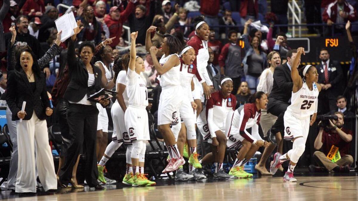 South Carolina celebrates a Tiffany Mitchell basket during the Elite Eight game last season.