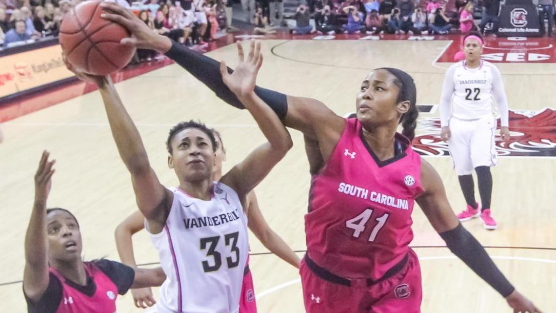South Carolina's Alaina Coates (41) blocks a shot by Vanderbilt's Christa Reed (33)