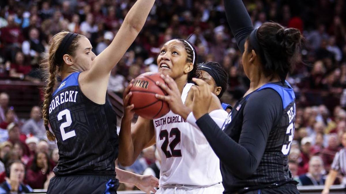 South Carolina's A'ja Wilson (22) battles down low against two Duke defenders in December 2015.