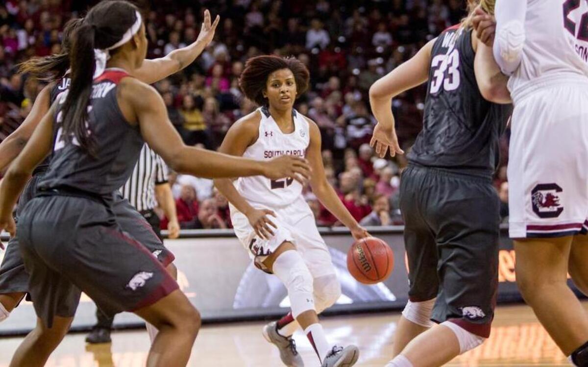 South Carolina's Tina Roy (23) looks for the lane as Arkansas defenders pressure during the first half of action in the Colonial Life Arena.