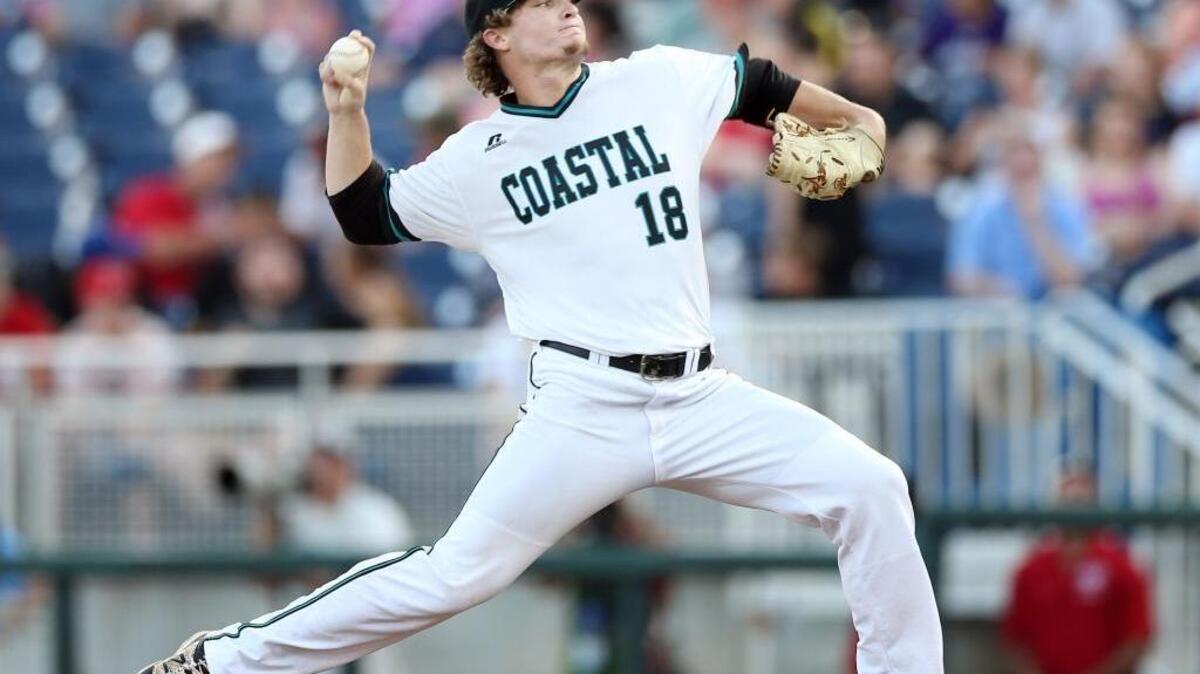 Coastal Carolina starting pitcher Alex Cunningham throws in the top of the first inning.