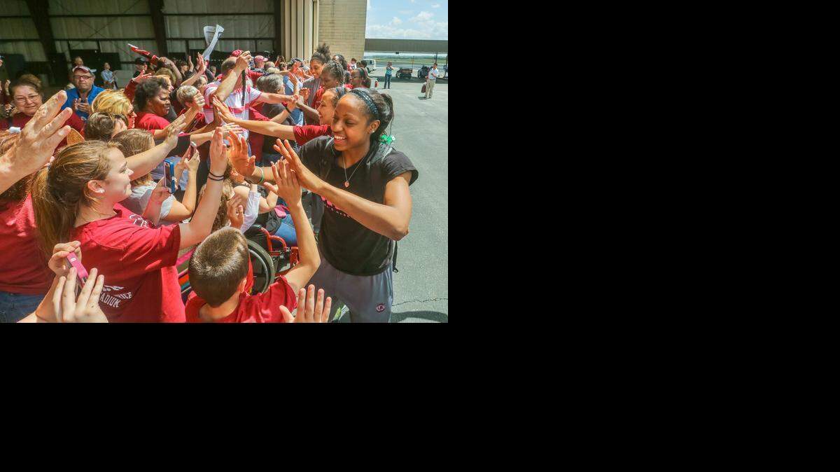 
Tiffany Mitchell and her teammates greeted a small but enthusiastic crowd of Gamecock fans who were at the airport to welcome the South Carolina Women's basketball team as they returned to Columbia Monday afternoon after playing in the Final Four Tournament in Tampa. 4/6/15.
