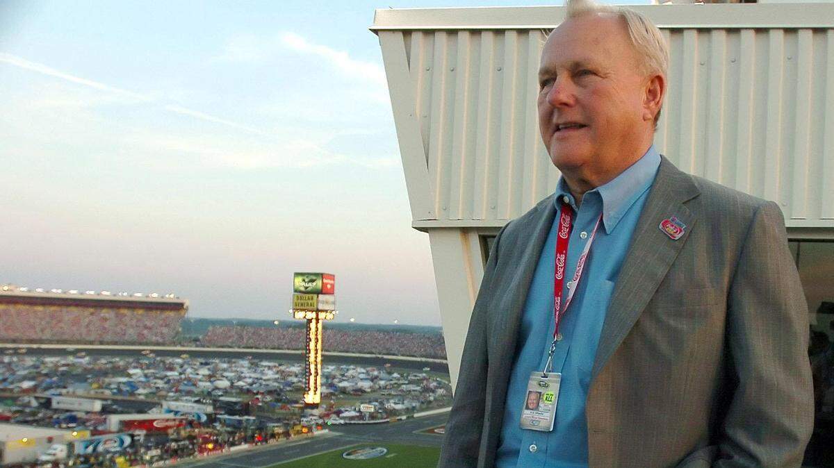 H.A. “Humpy” Wheeler looks out onto the running of the Coca-Cola 600 in 2010 at the speedway in Concord (now called Charlotte Motor Speedway). Wheeler retired from the track following the race.
