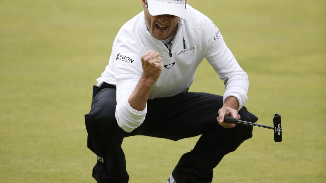 USA's Zach Johnson reacts after making his birdie putt on the 18th green during the final round of the British Open on Monday, July 21, 2015, at the Old Course in St. Andrews, Scotland. (Russell Cheyne/Action Images/Zuma Press/TNS)