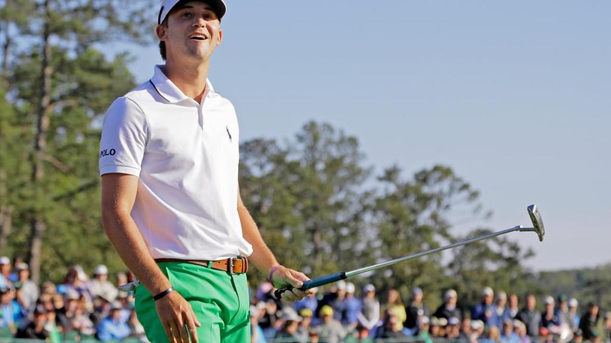 Smylie Kaufman reacts after missing a putt on the 18th green during the third round of the Masters golf tournament Saturday, April 9, 2016, in Augusta.