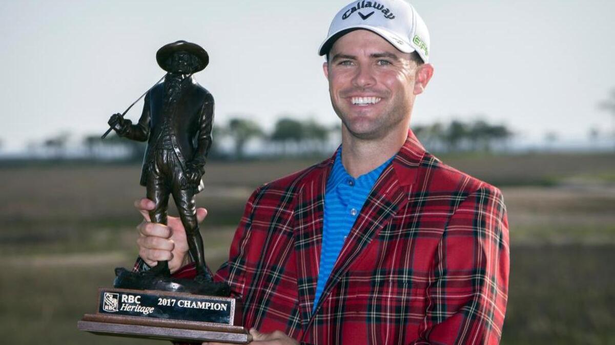 Wesley Bryan holds the trophy after winning RBC Heritage golf tournament in Hilton Head Island in April. He will be playing in the U.S. Open in June.