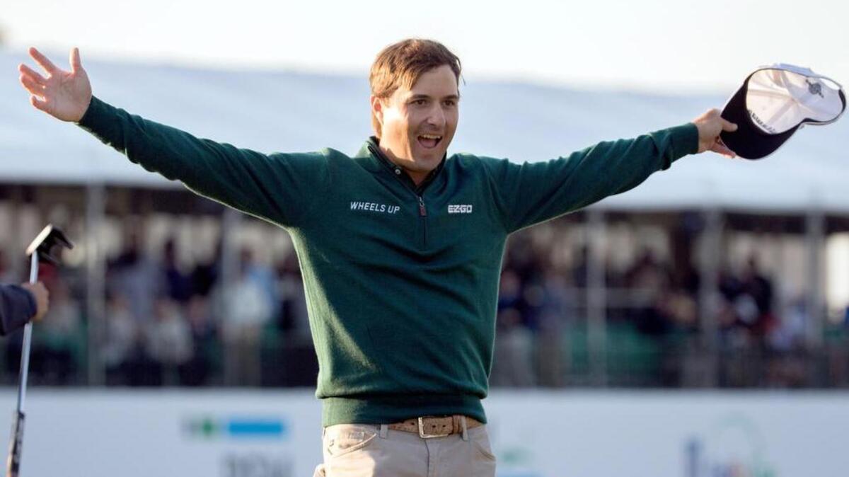Kevin Kisner celebrates after his winning putt during the final round at the RSM Classic golf tournament, Sunday, Nov. 22, 2015, in St. Simons Island, Ga.