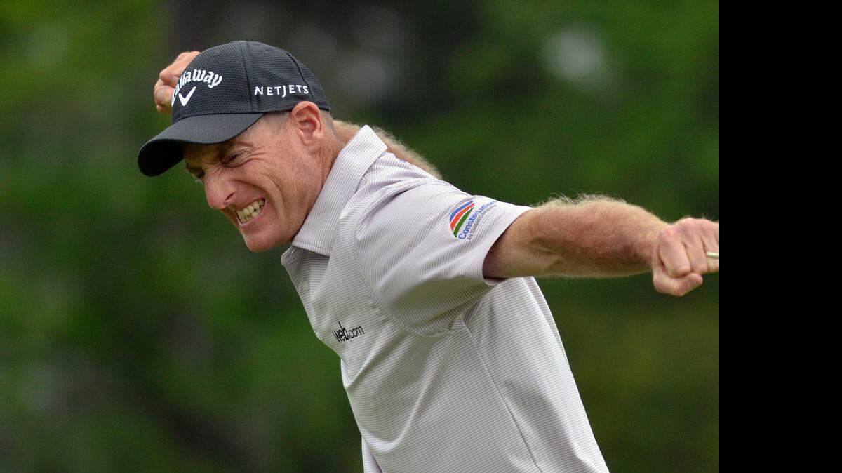 
Jim Furyk celebrates after making his birdie putt on the second hole of a sudden-death playoff against Kevin Kisner during Sunday’s final round of the RBC Heritage Presented by Boeing. The putt on the par-3 17th hole at Harbour Town Golf Links in Sea Pines on Hilton Head Island, S.C., secured Furyk’s second Heritage title and his first PGA Tour victory since 2010.
