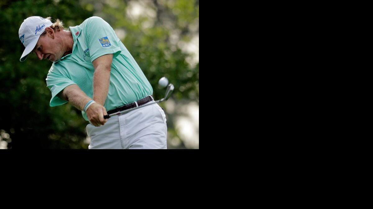 
Ernie Els tees off on the fourth hole during the second round of the Masters golf tournament Friday, April 10, 2015, in Augusta, Ga. 
