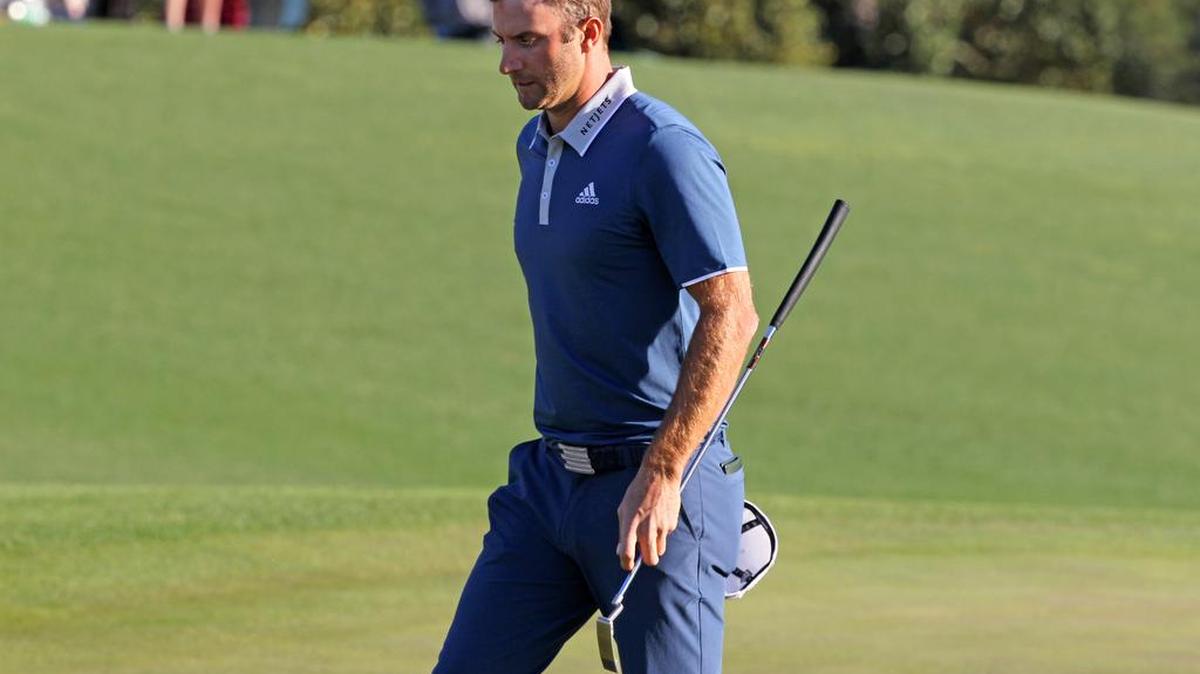 Augusta, GA - April 8, 2016: Dustin Johnson walks off the green after missing a short birdie putt on No. 18 during the second round of The Masters at Augusta National Golf Club in Augusta, Ga.