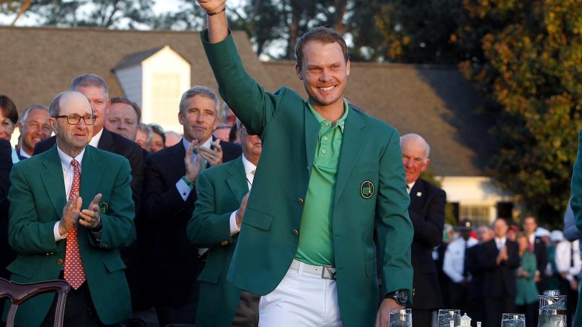 Danny Willett smiles as he wears his green jacket for winning the Masters at Augusta National Golf Club in Augusta.
