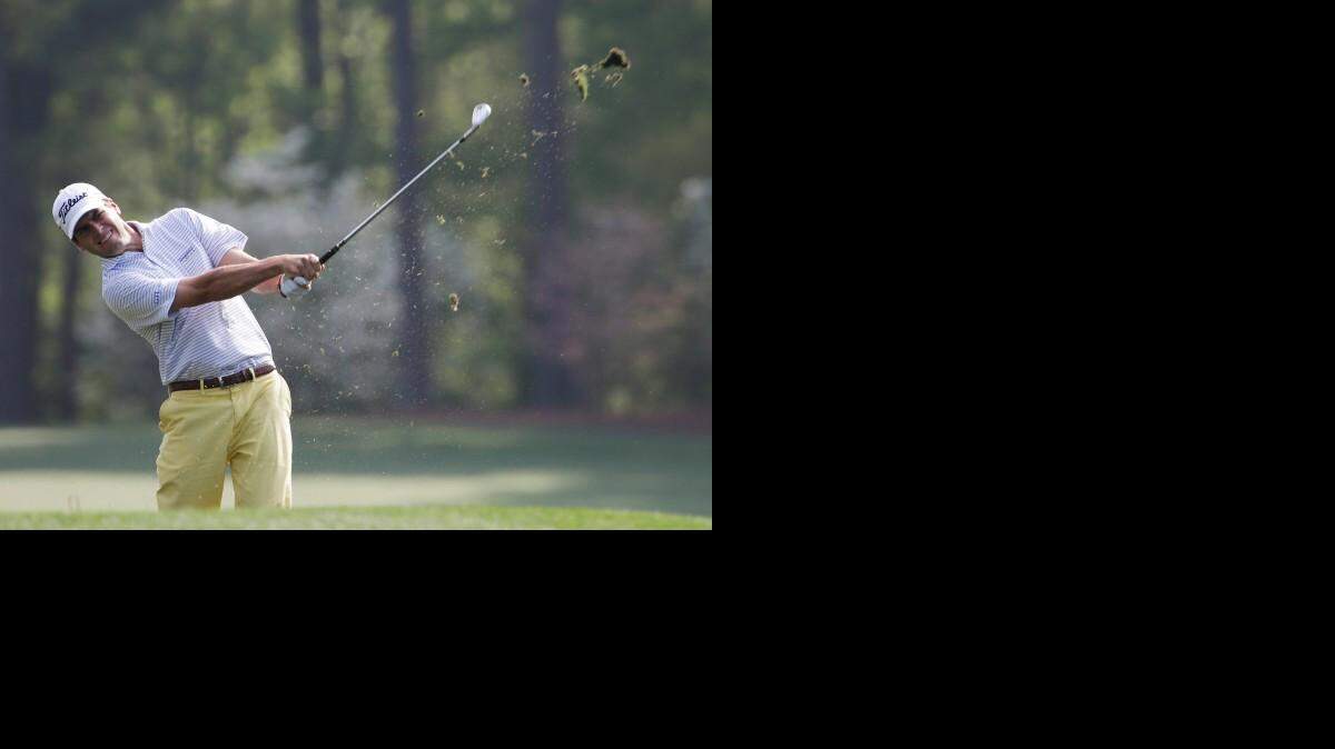 
Ben Martin hits on the 12th fairway during a practice round for the Masters golf tournament Wednesday, April 8, 2015, in Augusta, Ga.
