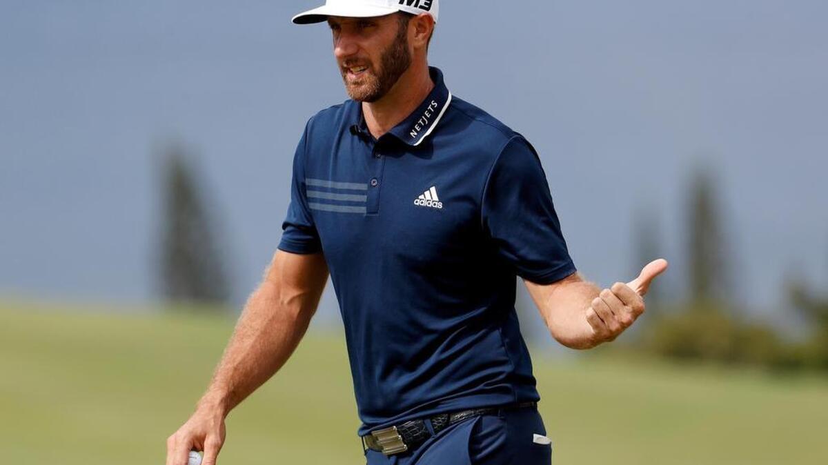 Dustin Johnson smiles after saving par on the fourth green during the final round of the Tournament of Champions golf event, Sunday, Jan. 7, 2018, at Kapalua Plantation Course in Kapalua, Hawaii.