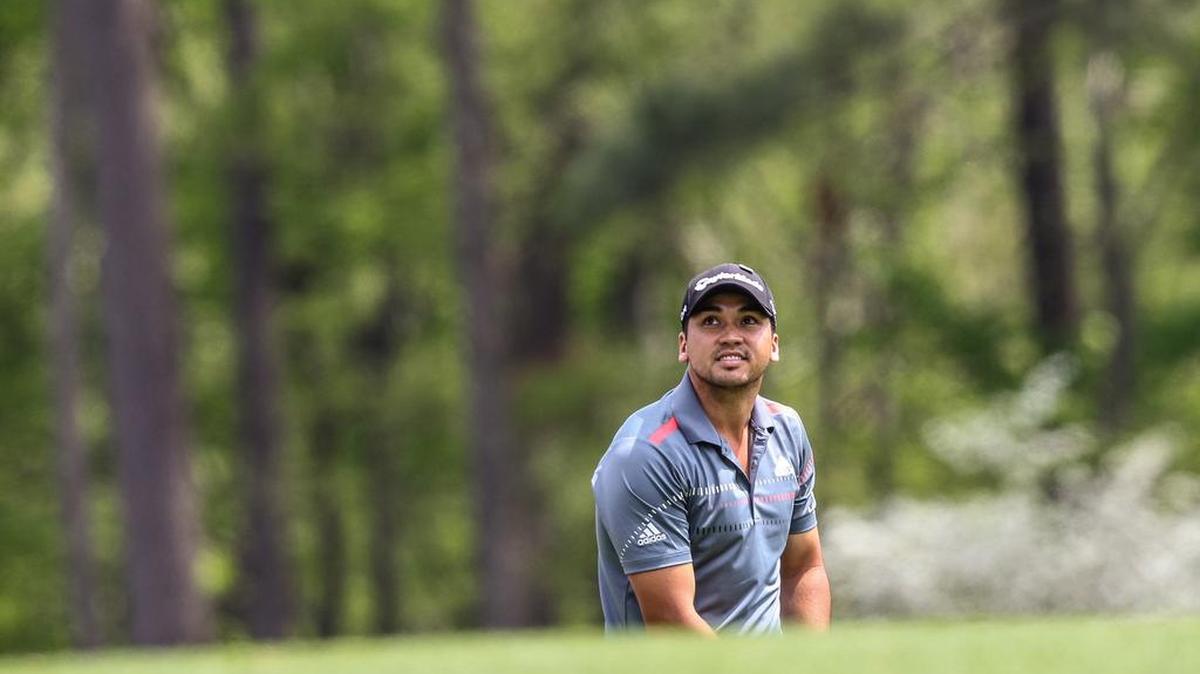 Jason Day looks at the wind in the trees on the 12th hole during the second round of the the Masters golf tournament in 2014.