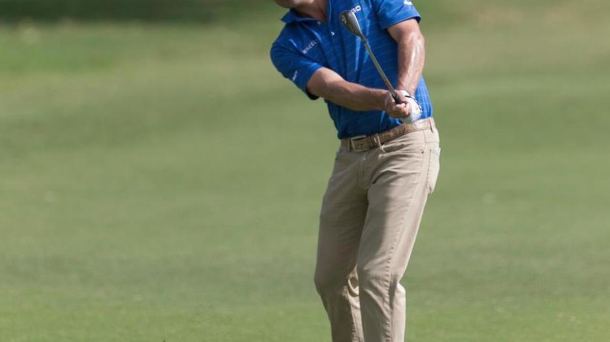 Kevin Kisner hits off the third fairway during the second round of the Sony Open golf tournament in Honolulu.