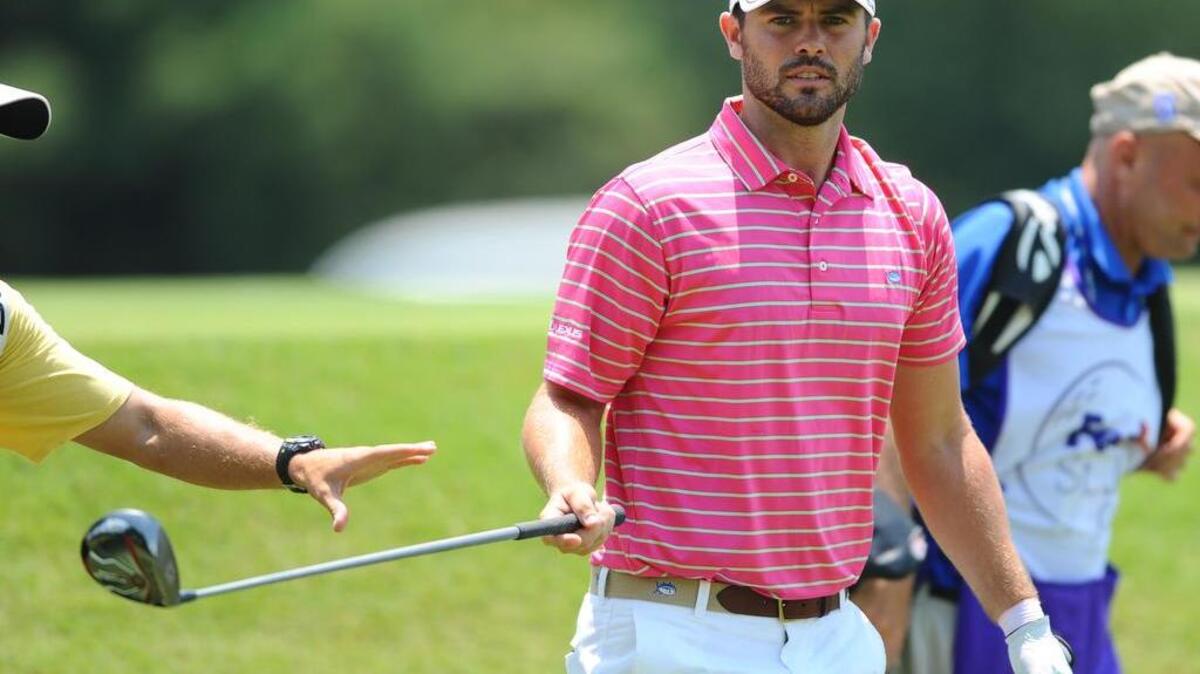 Wesley Bryan hands off his club after his tee shot on the third hole during the third round of the FedEx St. Jude Classic golf tournament at TPC Southwind in Memphis in June. He’s back on the PGA Tour this week in Illinois.
