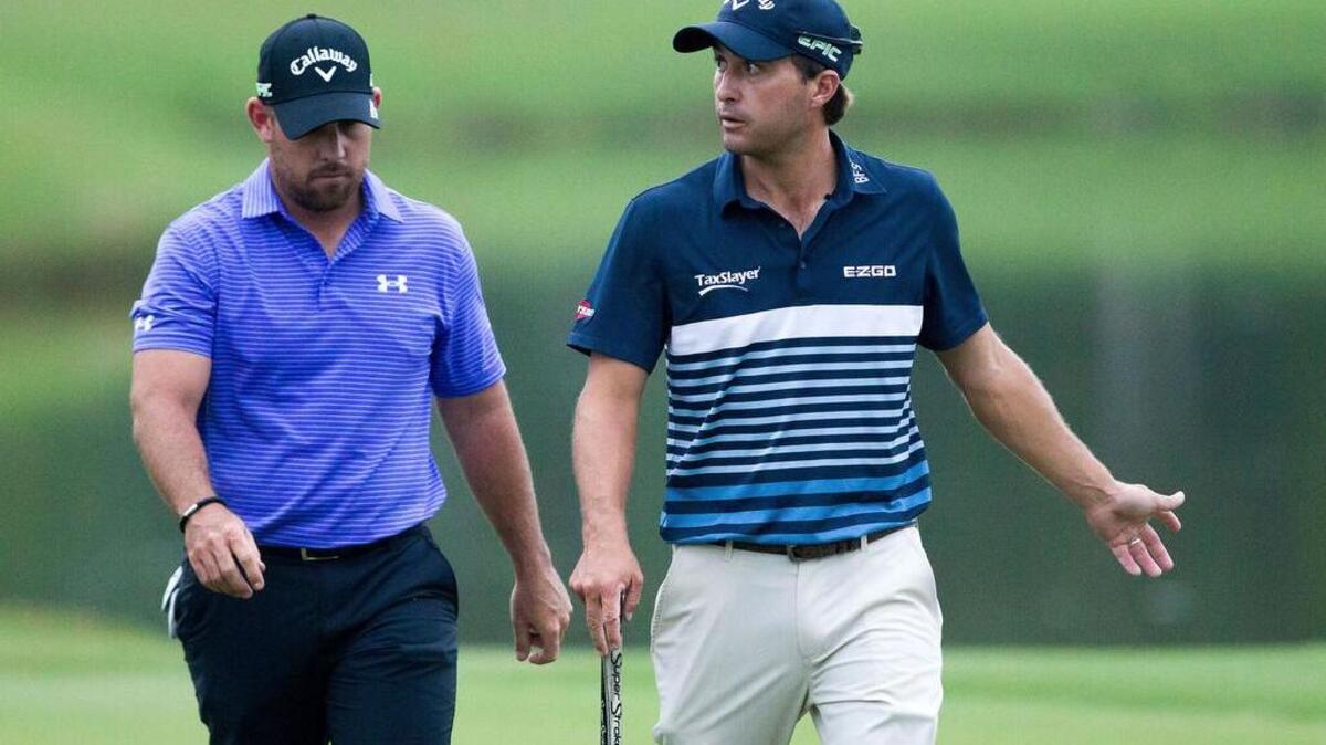 Teammates Scott Brown, left, and Kevin Kisner, who are both from Aiken, lost in a playoff at the PGA Zurich Classic golf tournament on Monday.