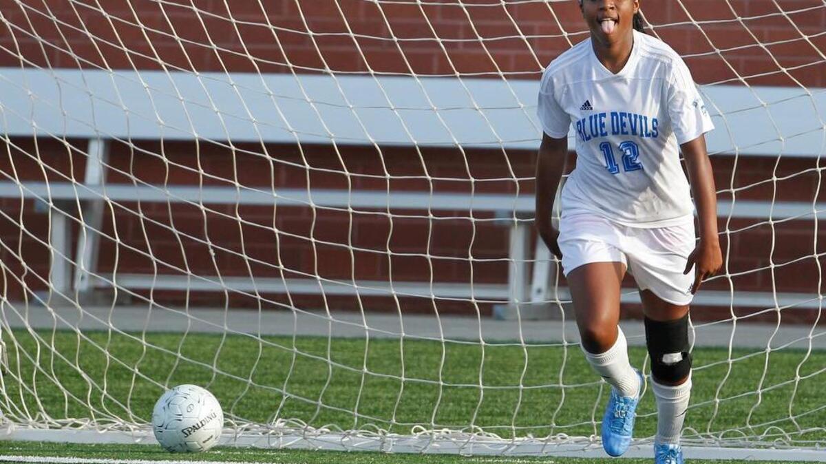 Kasey Parker celebrates after scoring a goal against Hilton Head in the Girls Class 3A state soccer championship game at River Bluff High School.